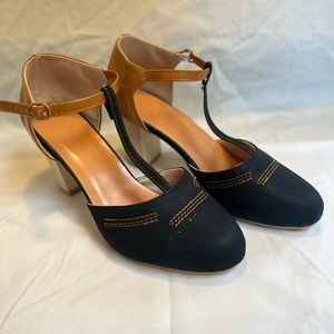 Navy and Tan t-strap pumps